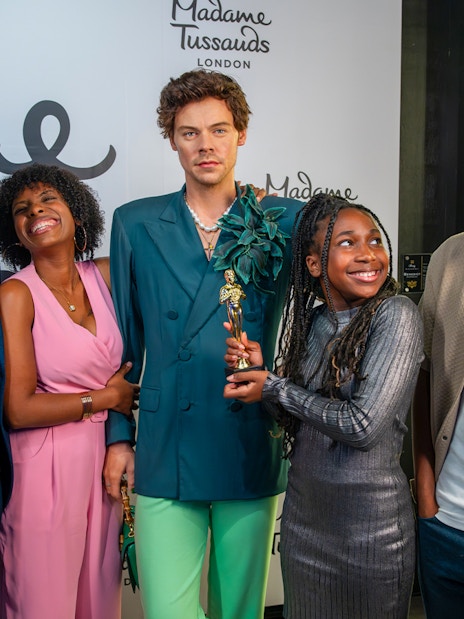 Harry Styles wax figure at Madame Tussauds London exhibit.