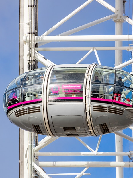 Westminster Abbey exterior with tourists, part of London tour combo including Tower of London and London Eye tickets.