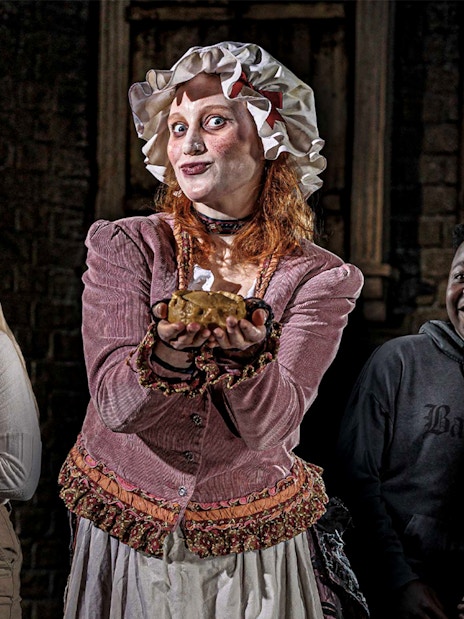 Mrs Lovett's Pie Shop interior at London Dungeon with vintage decor and pie display.