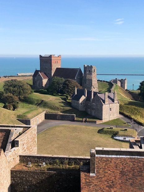 Dover Castle with lush green landscape, view from London tour.