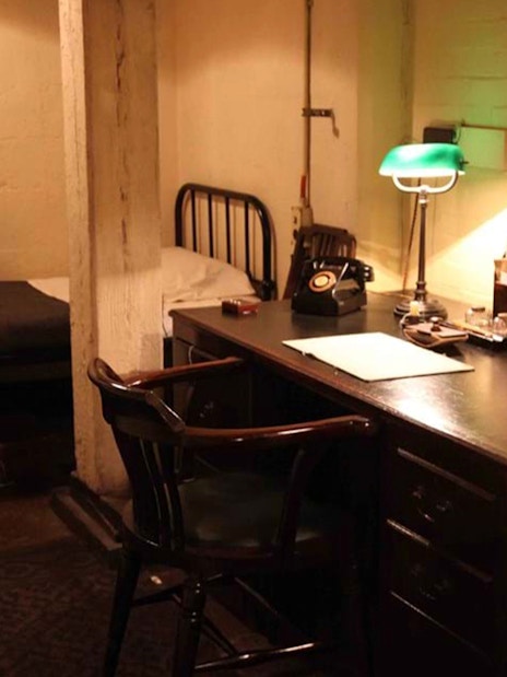 Churchill War Rooms entrance with visitors on Westminster WWII walking tour, London.