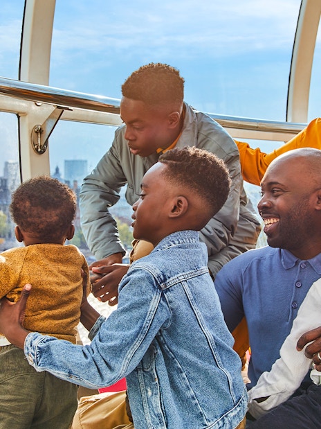 Westminster Abbey exterior with tourists, part of London tour combo including Tower of London and London Eye tickets.
