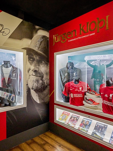 Visitors exploring the Liverpool FC Stadium during the tour, with Museum Entrance Tickets in Liverpool, England