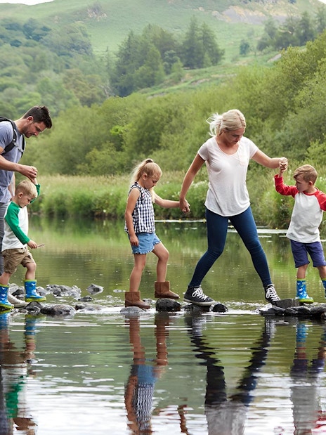 Lake District cruise with scenic views, part of a day tour from London including cream tea.