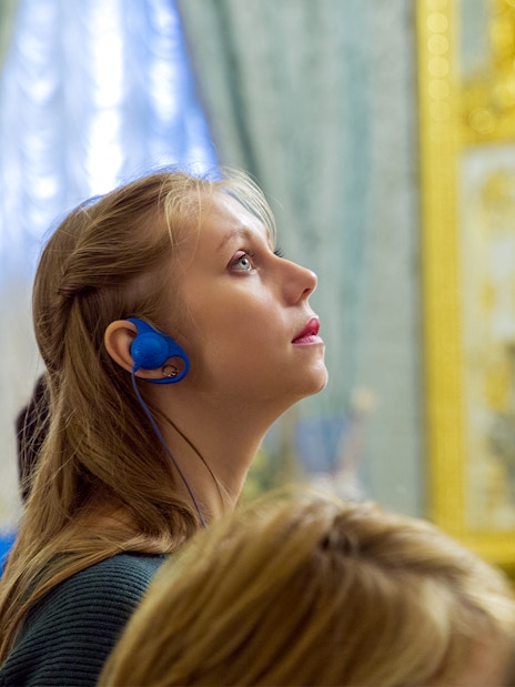 Visitor observing contemporary art at Moco Museum, Barcelona.