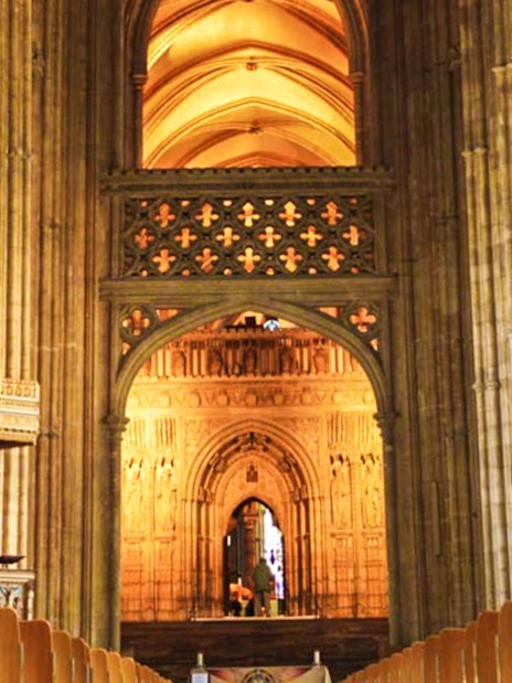 Tour group exploring the historic Leeds Castle, marveling at the majestic Canterbury Cathedral, and enjoying the breathtaking view of the White Cliffs of Dover.