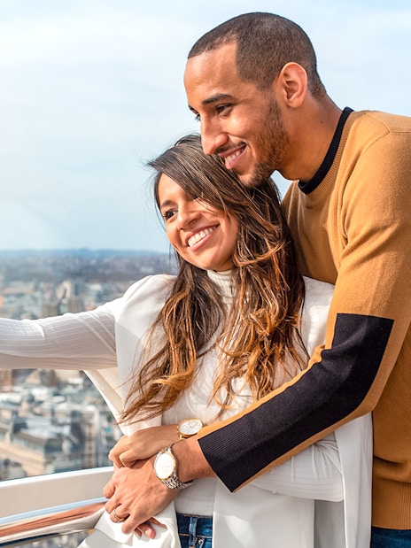 Couple taking a selfie inside london eye