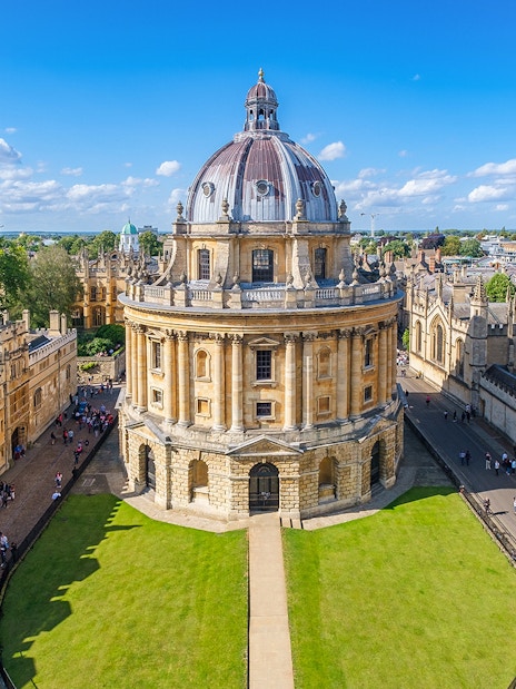 Bodleian Library Oxford with tourists exploring the historic architecture.