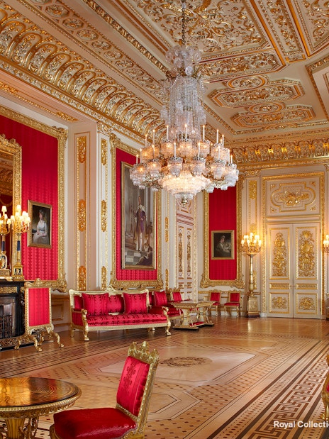 Crimson Drawing Room in Windsor Castle with ornate furnishings and historical decor.