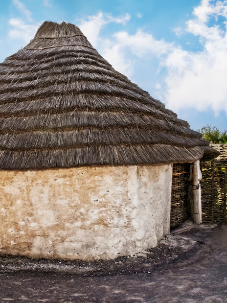 Stonehenge builders' houses recreations for ancient celebrations and rituals, England.