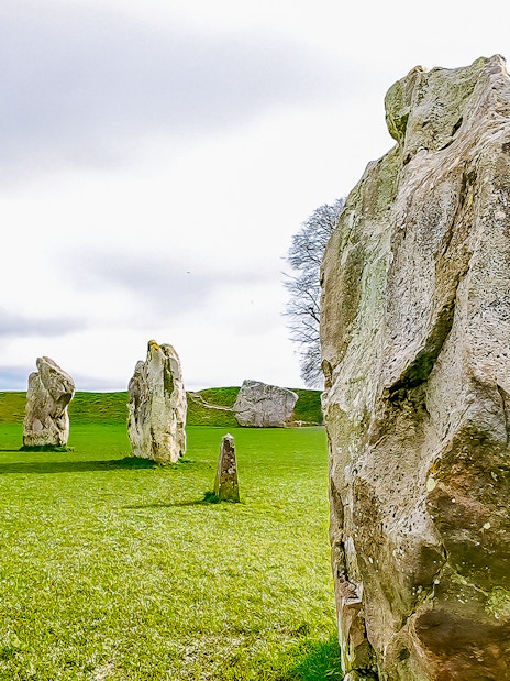 Avebury stone circle with ancient standing stones on a guided tour from London.